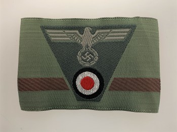 Army enlisted man's woven combined   M1943 trapezoid cap insignia