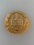 Northamptonshire Regiment metal cap badge in brass.