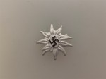 S.A. or S.S. mountain troops metal edelweiss badge