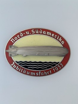Zeppelin 'Nord u Sud Amerika Jubilaumsfahrt 1933' enamel commemorative badge in RED.