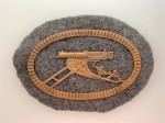 Imperial German WWI Machine Gunner's metal sleeve badge