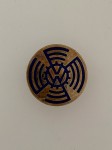 Volkswagen V.W.  factory enamel sun wheel commemorative badge.