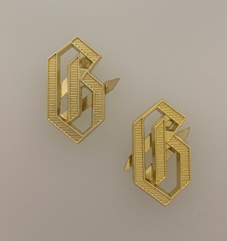 'G' metal cyphers for 'Germania ' shoulder boards. Gilt zinc issue for Officer's boards. Per pair.