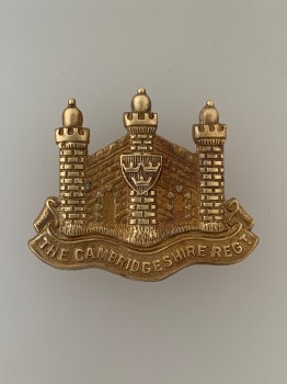 Cambridgeshire Regiment metal cap badge.
