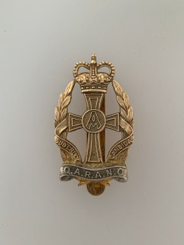 Queen Alexandra's Royal Army Nursing Corps metal cap badge.