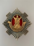 The Royal Scots (Royal Regiment) metal cap or bonnet badge ANTIQUED