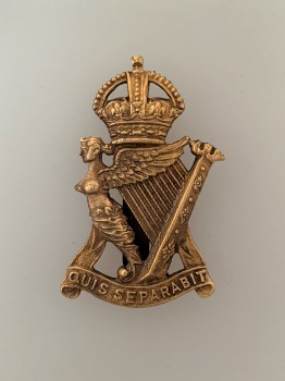 Royal Irish Rifles metal cap badge. Brass WW1 Economy issue  ANTIQUED