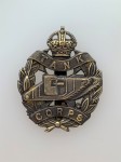 WWI Tank Corps metal cap badge ANTIQUED.