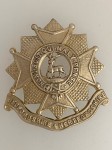 Bedfordshire and Hertsfordshire Regiment metal cap badge.