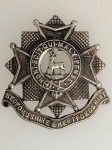 Bedfordshire and Hertsfordshire Regiment metal cap badge. ANTIQUED